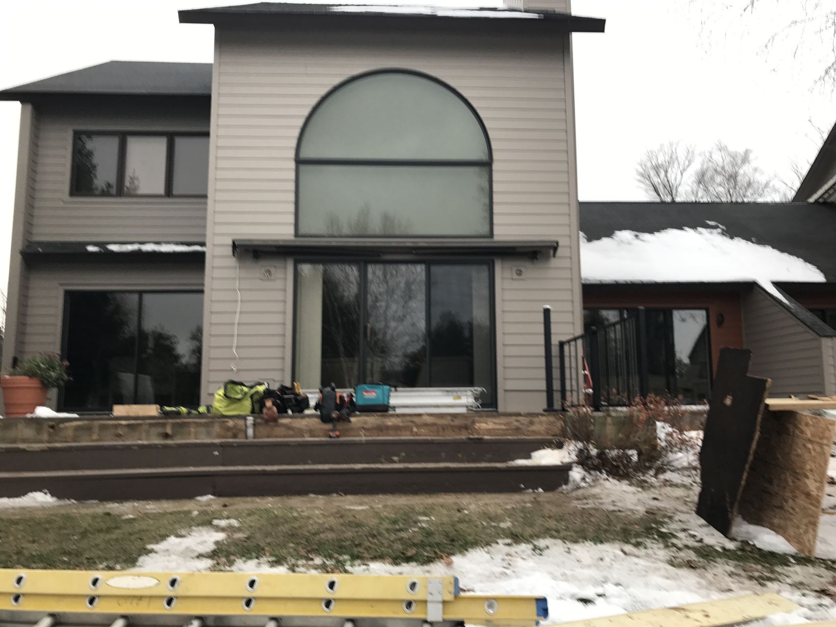 Deck work at a Petoskey home during a Northern Michigan winter