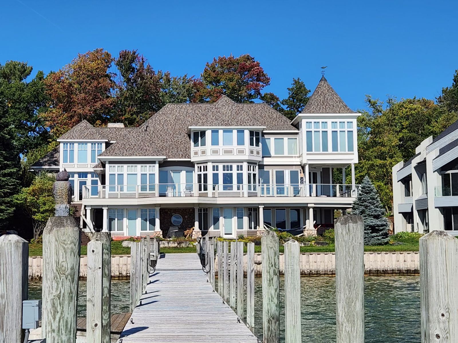 Painting, siding, and masonry on a large home on Lake Charlevoix