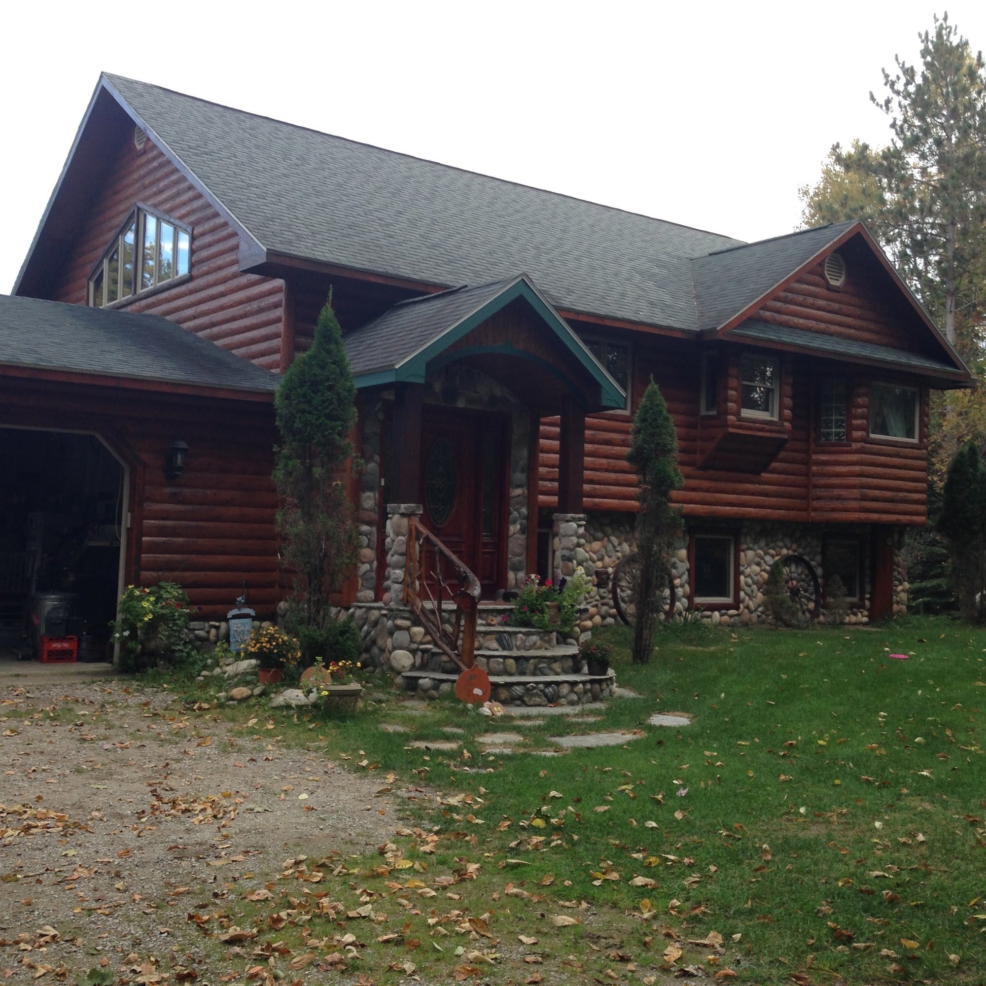 Log home exterior work by TNT Construction